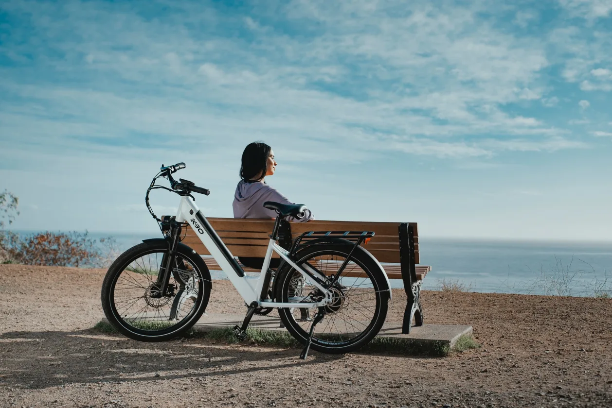 woman taking a break from riding electric KBO bike